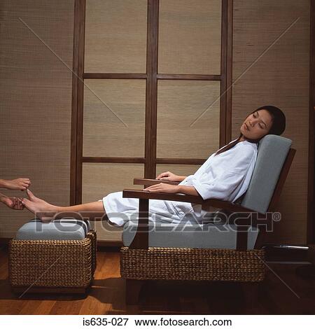 Woman having a pedicure in spa View Large Photo Image Stock Photo - Woman having a pedicure in spa. Fotosearch
