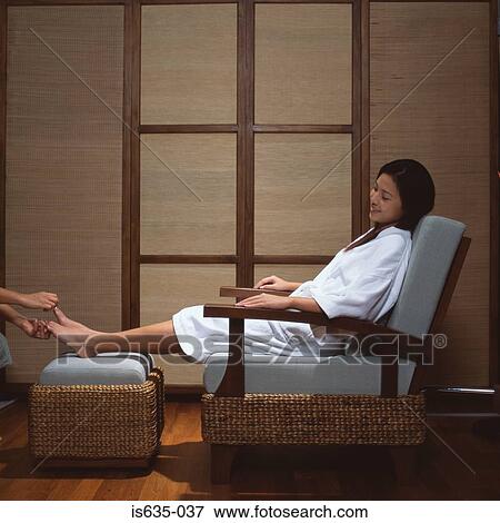 Woman having a pedicure in spa View Large Photo Image Stock Photo - Woman having a pedicure in spa. Fotosearch