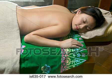 Woman sleeping on massage table View Large Photo Image Stock Photo - Woman sleeping on massage table. Fotosearch