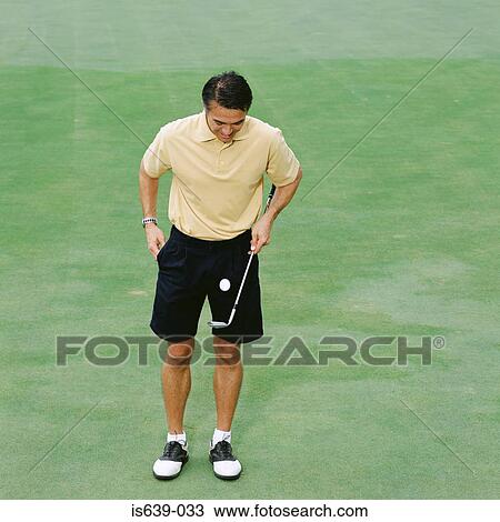 Male golfer on green View Large Photo Image Stock Image - Male golfer on green. Fotosearch