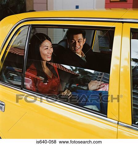 Couple in taxicab View Large Photo Image Stock Photo - Couple in taxicab. Fotosearch