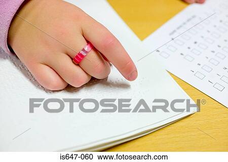 Blind girl reading braille View Large Photo Image Stock Image - Blind girl reading braille. Fotosearch