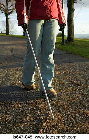 Blind woman using a cane View Large Photo Image Stock Photography - Blind woman using a cane. Fotosearch