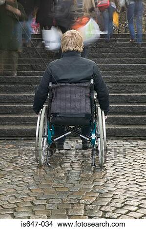 Disabled man at bottom of stairway View Large Photo Image Picture - Disabled man at bottom of stairway. Fotosearch