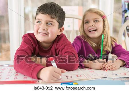 Brother and sister doing homework View Large Photo Image Stock Image - Brother and sister doing homework. Fotosearch