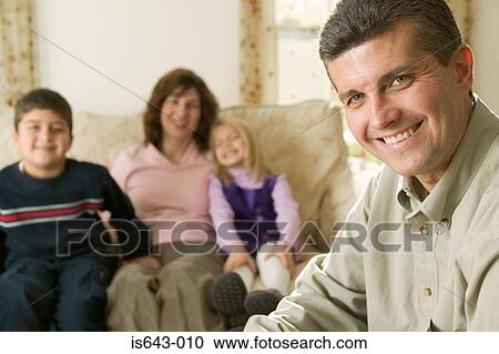 Stock Image - Father and his family. Fotosearch