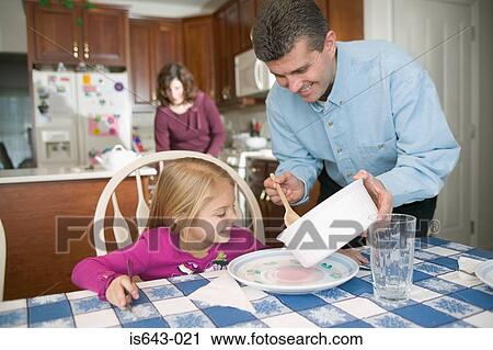 Father serving dinner for daughter View Large Photo Image Stock Image - Father serving dinner for daughter. Fotosearch