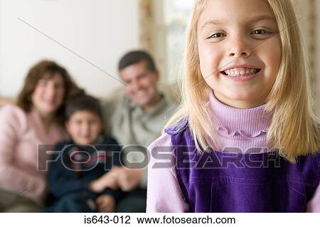 Stock Image - Girl and her family. Fotosearch