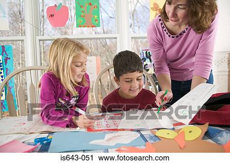 Mother teaching children View Large Photo Image Stock Image - Mother teaching children. Fotosearch
