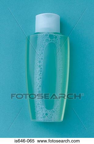 A bottle of green lotion View Large Photo Image Stock Photography - A bottle of green lotion. Fotosearch