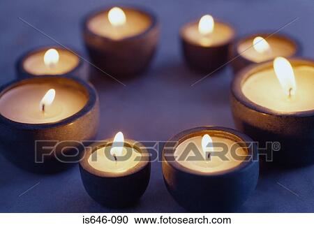 Stock Image - A circle of candles. Fotosearch