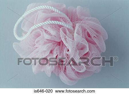 A pink exfoliating sponge View Large Photo Image Stock Image - A pink exfoliating sponge. Fotosearch