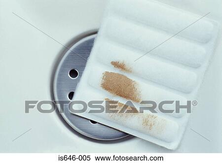 A used cotton pad in a sink View Large Photo Image Stock Photography - A used cotton pad in a sink. Fotosearch