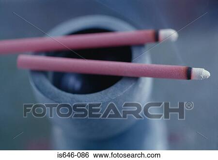 Burning incense sticks View Large Photo Image Stock Photograph - Burning incense sticks . Fotosearch