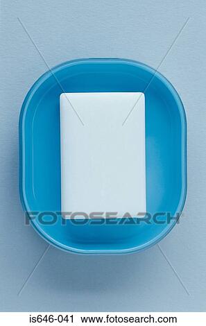 Stock Image - Soap in a blue soap dish. Fotosearch