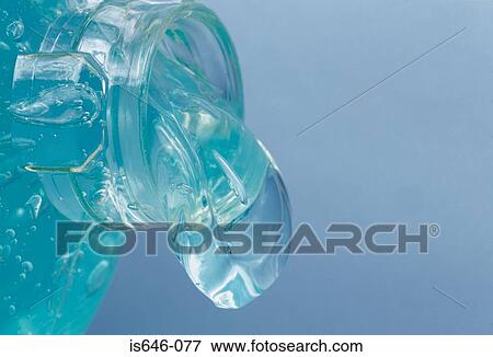 Turquoise gel being poured View Large Photo Image Stock Photo - Turquoise gel being poured. Fotosearch