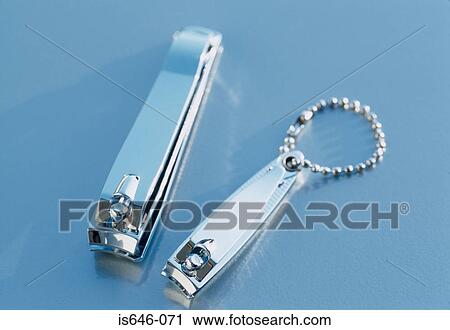Stock Image - Two nail clippers. Fotosearch