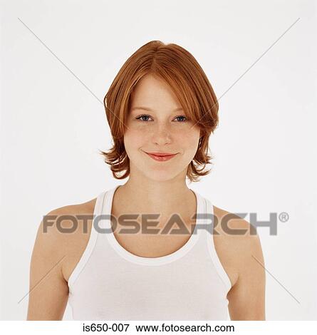 Stock Photo - Young red-headed woman. Fotosearch