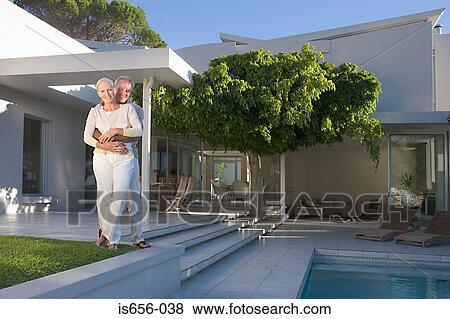 Mature couple on patio View Large Photo Image Stock Photo - Mature couple on patio. Fotosearch
