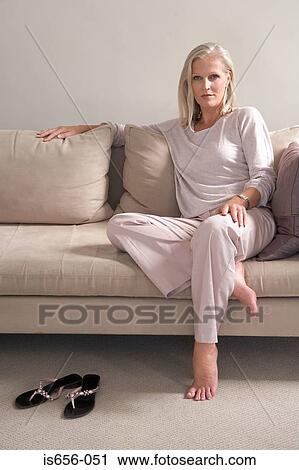 Mature woman on sofa View Large Photo Image Stock Image - Mature woman on sofa. Fotosearch
