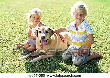 Brother and sister with labrador View Large Photo Image Stock Image - Brother and sister with labrador. Fotosearch