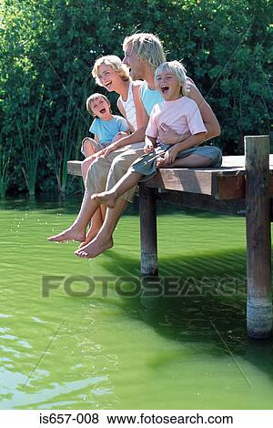 Family on a jetty View Large Photo Image Stock Photo - Family on a jetty. Fotosearch