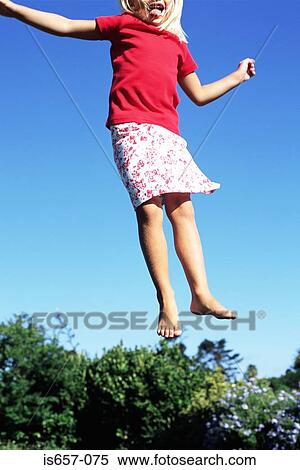 Girl jumping View Large Photo Image Stock Photography - Girl jumping. Fotosearch
