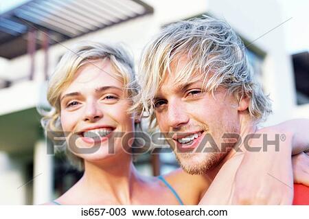Stock Image - Happy young couple. Fotosearch