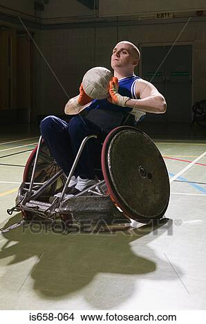Basketball player in a wheelchair View Large Photo Image Picture - Basketball player in a wheelchair. Fotosearch
