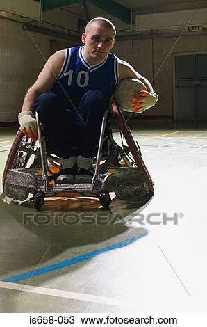 Basketball player in a wheelchair View Large Photo Image Stock Image - Basketball player in a wheelchair. Fotosearch