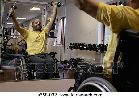 Disabled man lifting weights View Large Photo Image Stock Image - Disabled man lifting weights. Fotosearch