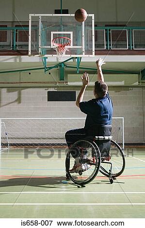 Disabled man playing basketball View Large Photo Image Stock Photo - Disabled man playing basketball. Fotosearch