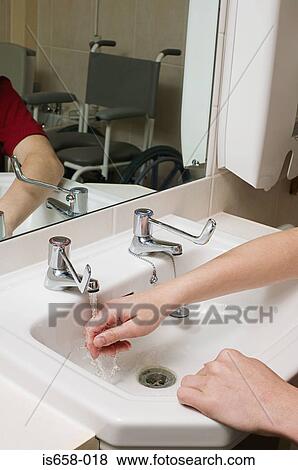 Person washing hands View Large Photo Image Stock Photo - Person washing hands. Fotosearch