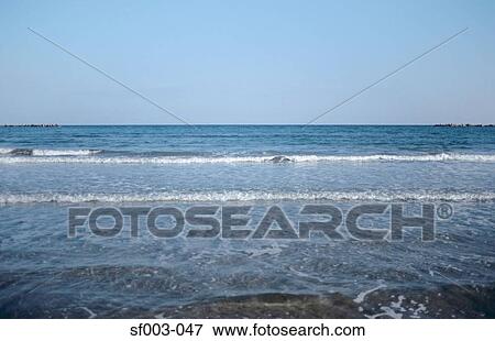 Stock Photo - Breaking waves . Fotosearch