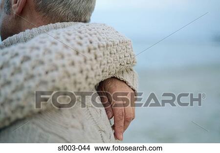 Close up of couple hugging View Large Photo Image Picture - Close up of couple hugging. Fotosearch