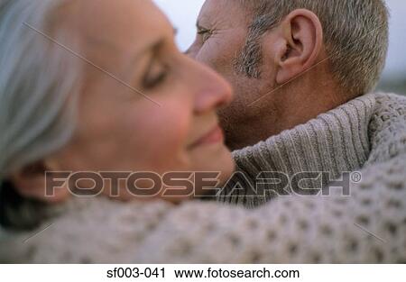 Senior couple hugging View Large Photo Image Stock Image - Senior couple hugging. Fotosearch