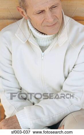 Stock Photo - Senior man looking thoughtful. Fotosearch