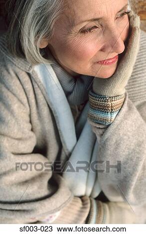 Senior woman looking thoughtful View Large Photo Image Stock Image - Senior woman looking thoughtful. Fotosearch