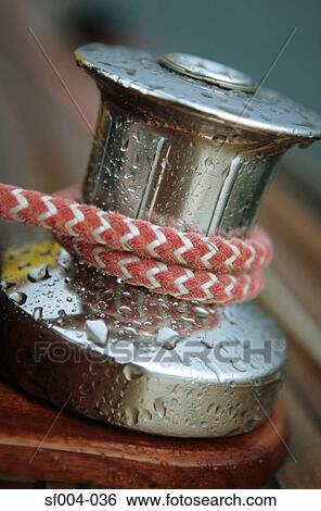 Close-up of rope around capstan View Large Photo Image Stock Photograph - Close-up of rope around capstan. Fotosearch