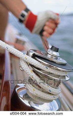 Man cranking capstan View Large Photo Image Picture - Man cranking capstan. Fotosearch