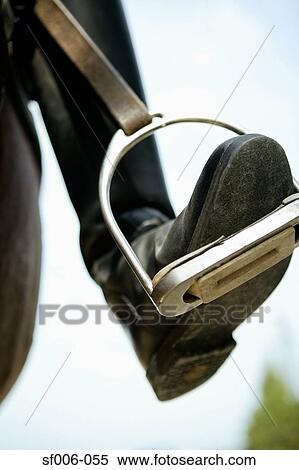 A foot in a stirrup View Large Photo Image Stock Photography - A foot in a stirrup. Fotosearch