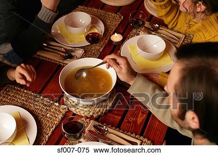 Friends about to eat soup View Large Photo Image Stock Photography - Friends about to eat soup. Fotosearch