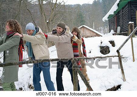 Stock Photograph - Friends holding each other's shoulders. Fotosearch