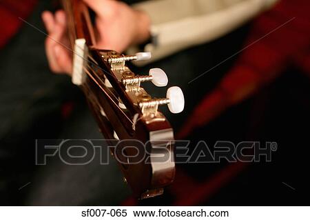 Man playing guitar View Large Photo Image Stock Photography - Man playing guitar. Fotosearch