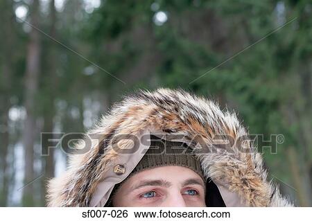 Man wearing a furry hood View Large Photo Image Stock Photograph - Man wearing a furry hood. Fotosearch