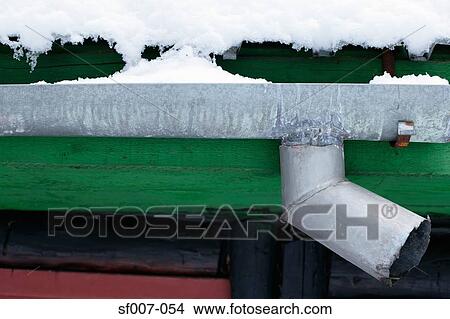 Snow on the roof of a hut View Large Photo Image Picture - Snow on the roof of a hut. Fotosearch