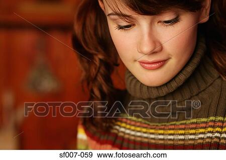 Young woman in roll neck sweater View Large Photo Image Stock Photo - Young woman in roll neck sweater. Fotosearch
