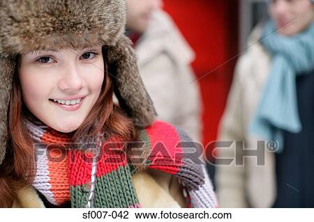 Young woman with male friends View Large Photo Image Stock Image - Young woman with male friends. Fotosearch