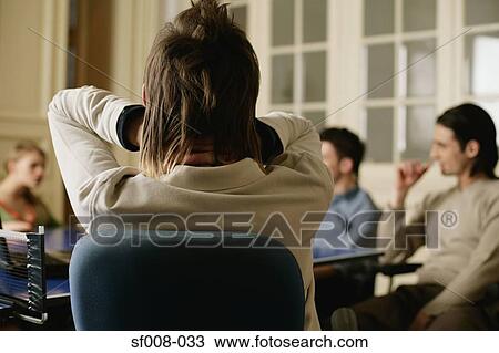 Colleagues having a discussion View Large Photo Image Stock Image - Colleagues having a discussion. Fotosearch