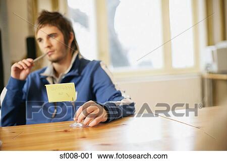 Man at desk thinking View Large Photo Image Stock Image - Man at desk thinking. Fotosearch